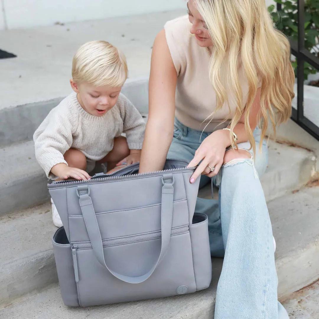 Backpack or Tote? Choosing the Right Diaper Bag for Your Parenting Style