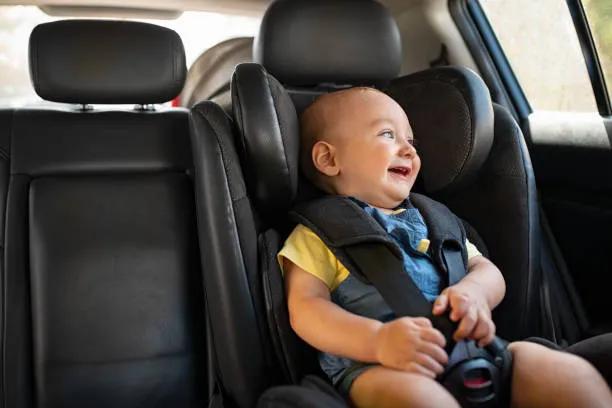 The Physics of Protection: How a Car Seat Acts as a "Safety Cocoon" for Developing Spines